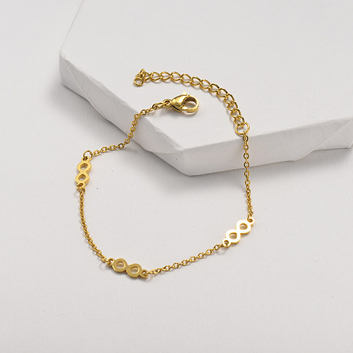 Golden stainless steel bracelet with figure 8 pendant