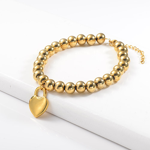 Golden stainless steel steel ball bracelet with heart-shaped lock pendant