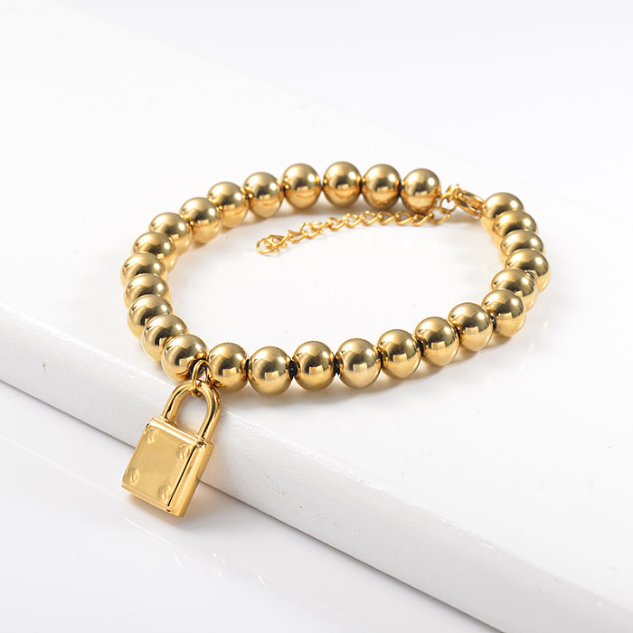 Golden stainless steel steel ball bracelet with lock pendant