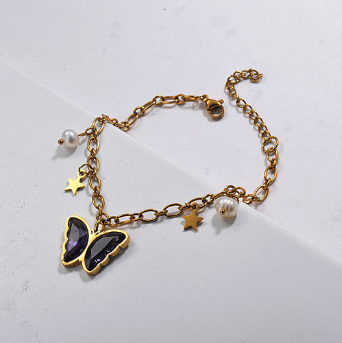 Pulsera con dije de mariposa y perlas de cristal