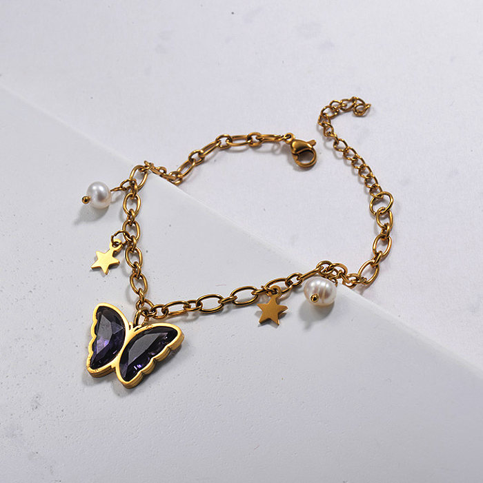 Bracelet à breloques papillon et perles de cristal