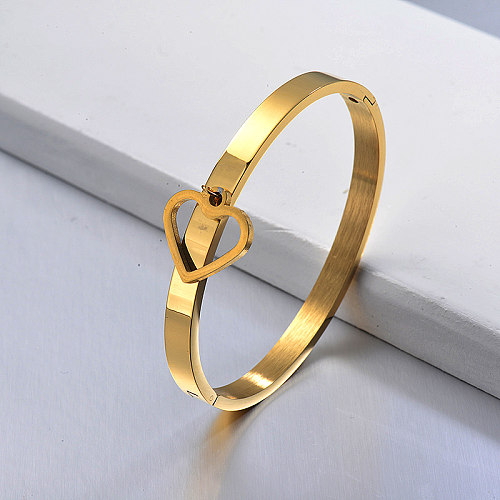 Solid gold stainless steel bracelet with hollow heart pendant