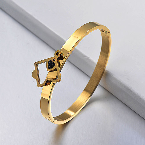 Gold stainless steel solid bracelet with puzzle pendant