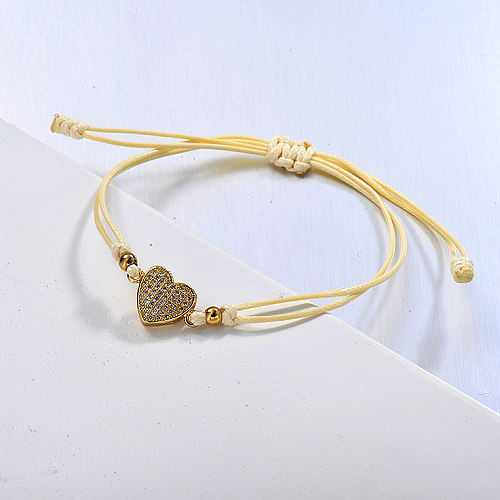 Pulsera de hilo amarillo con colgante de racimo de circonitas en forma de corazón delicado