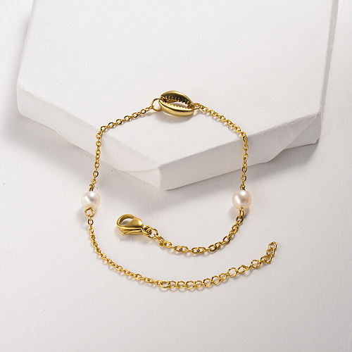 Simple gold stainless steel bracelet with shell pendant