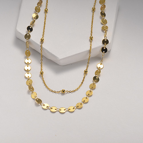 Small disc layered gold necklace