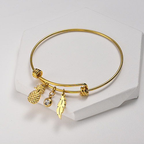 Golden stainless steel adjustable bracelet with pineapple, zircon, leaf pendant