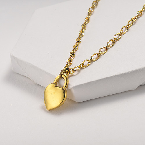 Small gold necklace with small pendant