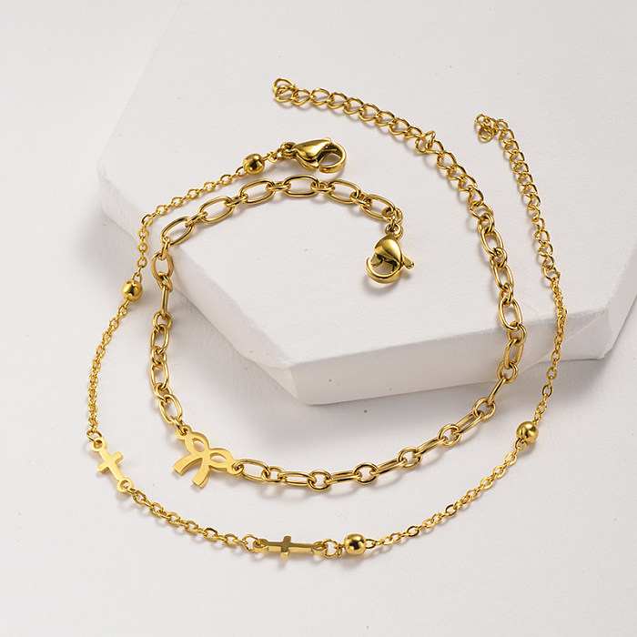 Golden stainless steel chain bracelet with small pendant