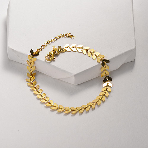 Fishbone shaped golden stainless steel bracelet