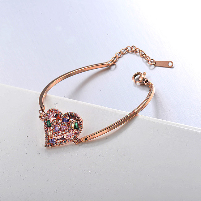 Bracelet ouvert en acier inoxydable or rose avec pendentif cœur en cuivre
