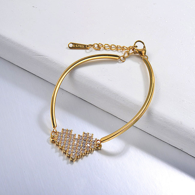 Pulsera chapada en oro con delicada forma de corazón de cobre con racimo de circonitas Pendany