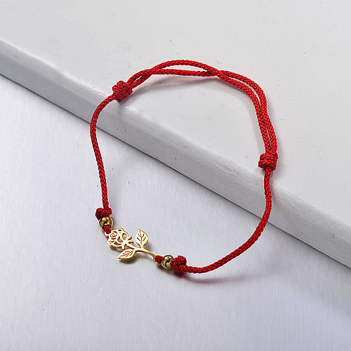 Red rope braided bracelet with golden stainless steel rose pendant