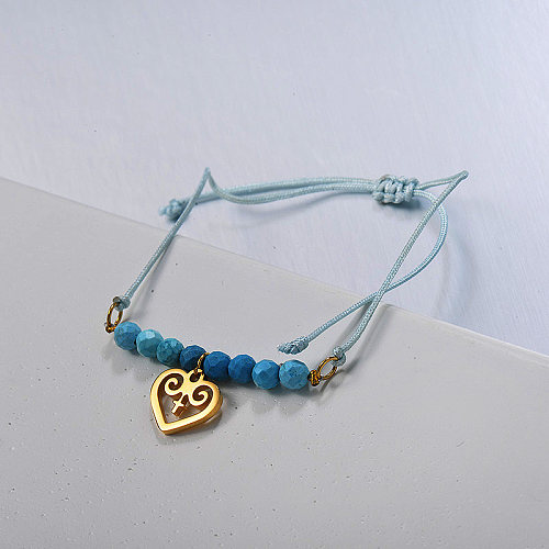 Simple ethnic style blue beaded braided bracelet with hollow heart pendant