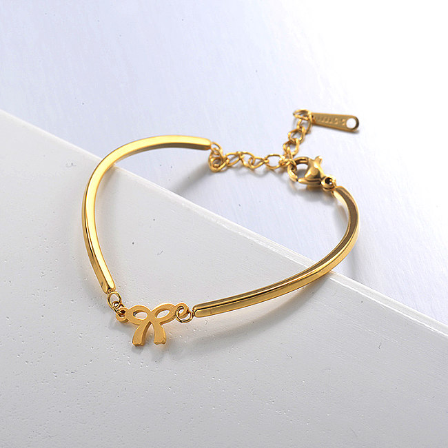Gold stainless steel open bracelet with eye pendant