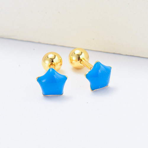 Pendientes piercing chapados en oro con estrella de esmalte azul