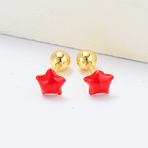 Pendientes piercing chapados en oro estrella roja