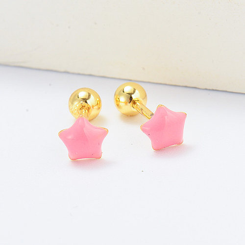 Pendientes piercing chapados en oro con estrella de esmalte rosa