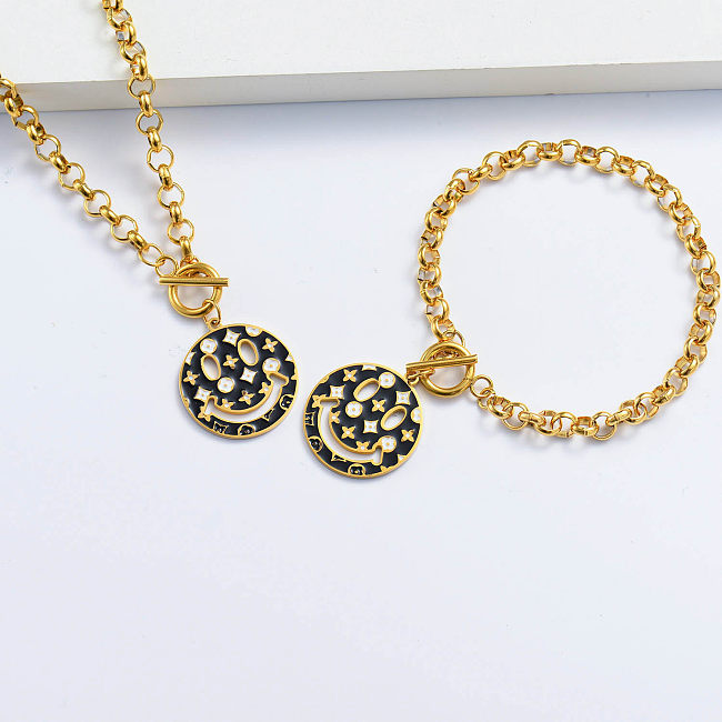 gold plated black smiley with clover bracelet and necklace set