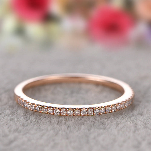 anillo de oro rosa con diamantes para niña