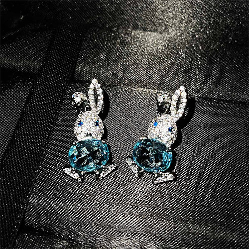 Jolies boucles d'oreilles lapin diamant saphir femme