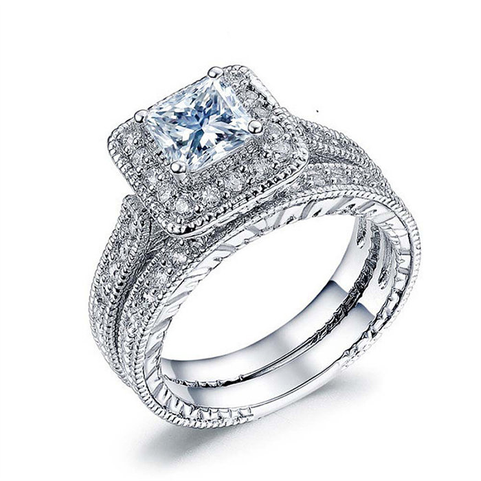diseño de anillo de lujo de diamante cuadrado plateado para parejas