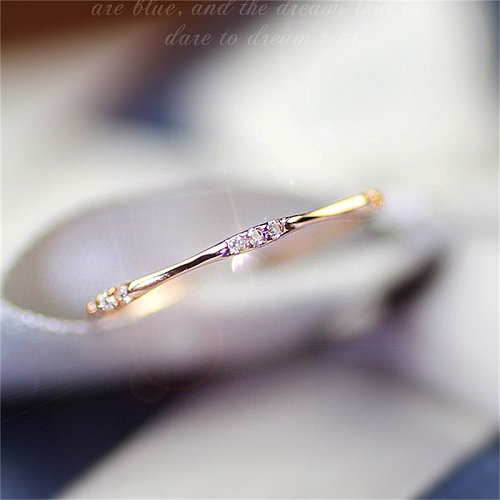 fine 14k gold delicate ring with nine diamonds for women