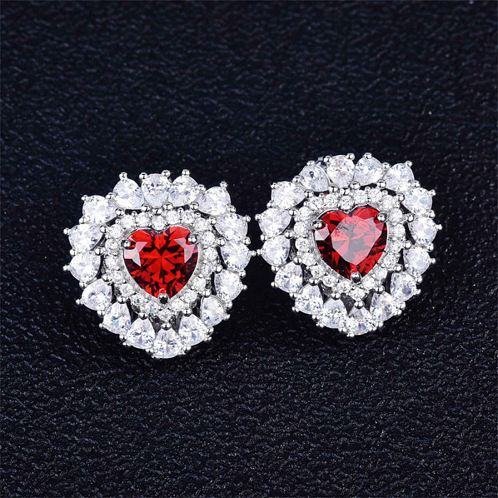belles boucles d'oreilles coeur rubis avec diamants pour femme