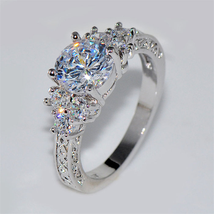 Lujosos anillos de promesa de diamantes con corazones y flechas para mujer