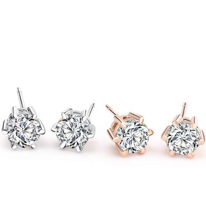Pendientes de tuerca chapados en plata con diamantes de moda simples para mujer
