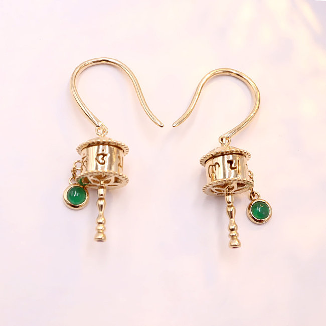 antike goldene Ohrringe mit Smaragd zum Schutz