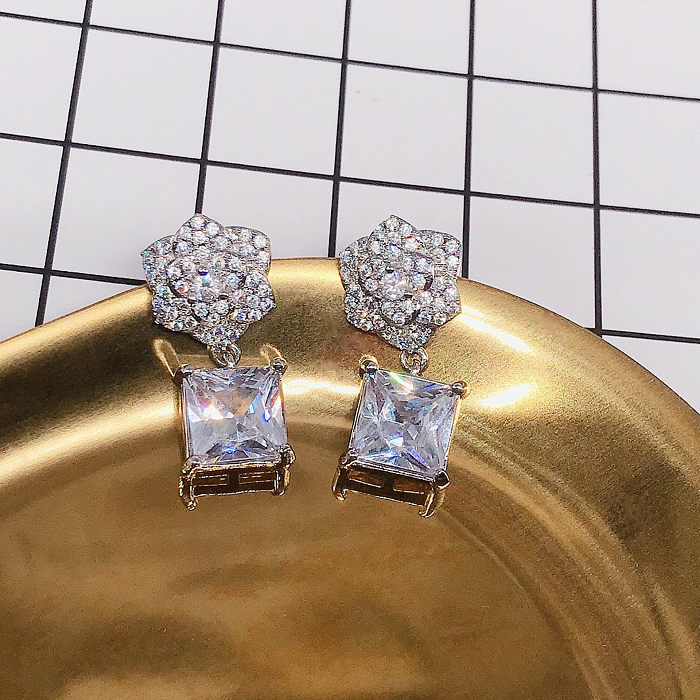 Boucles d'oreilles luxueuses en forme de fleur de diamant pour femme