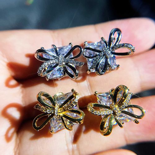 cute diamond silver plated bow shaped earrings for women