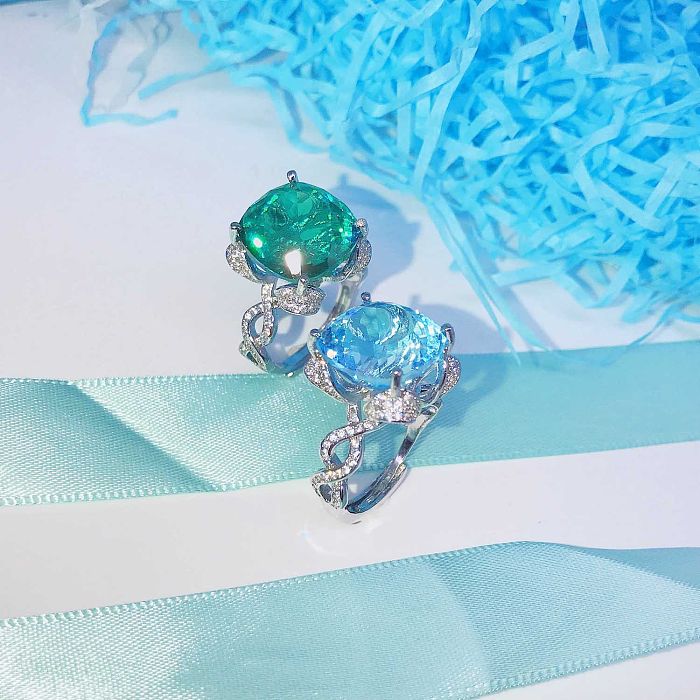 topaz and emerald rings 15 carats for banquet