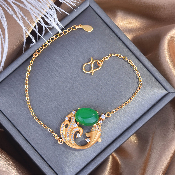 Antike Goldarmbänder mit Smaragd für Frauen