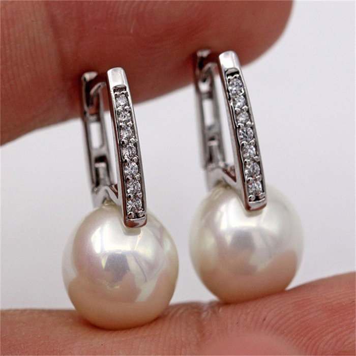 belles boucles d'oreilles en or 18 carats avec perle naturelle pour femme