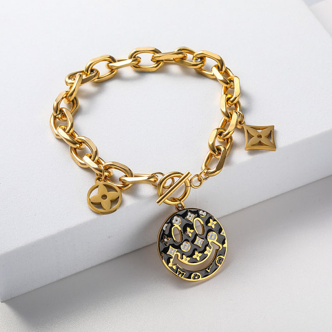 bracelet en acier inoxydable plaqué or avec pendentif