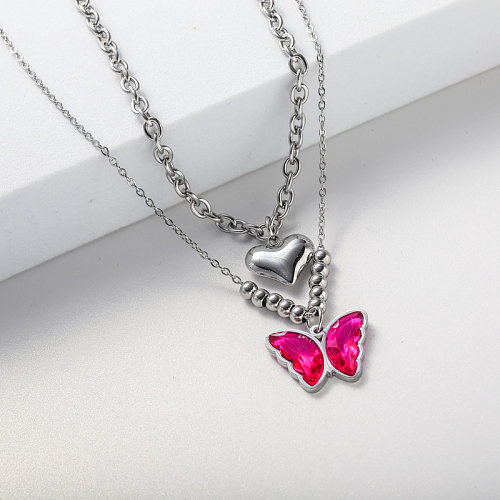 Collier en acier inoxydable avec pendentif en forme de cœur et papillon