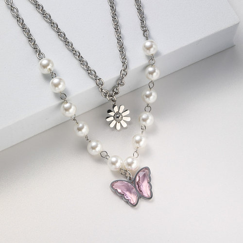 collier de perles papillon rose