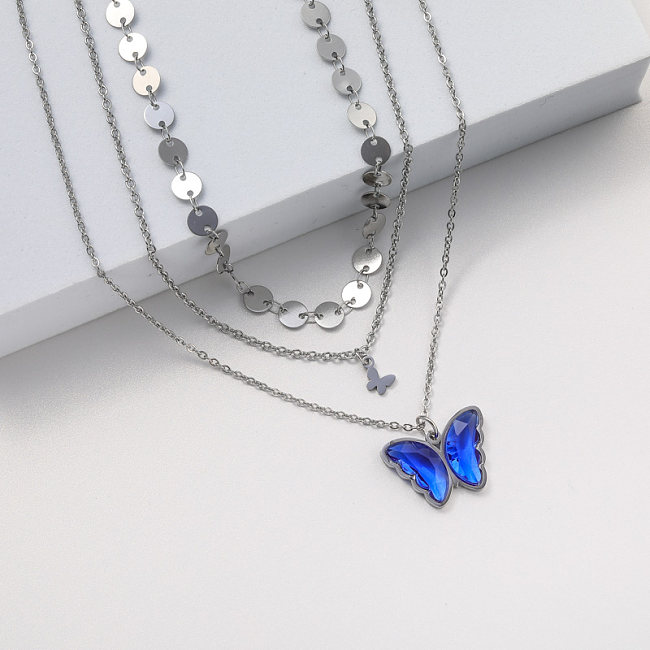collier papillon pendentif bleu