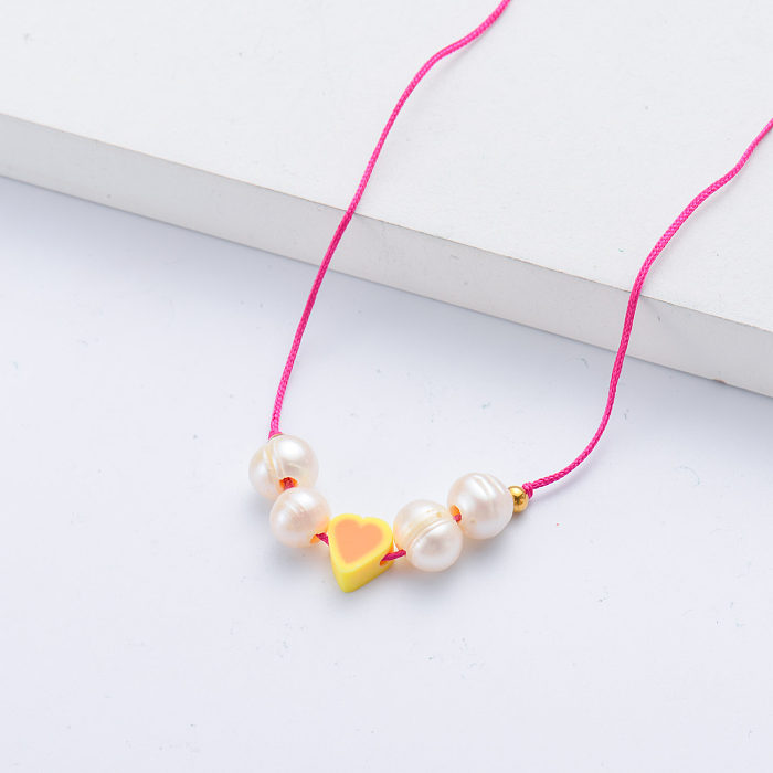 new design anti-allergy yellow red heart charm with pink rope necklace