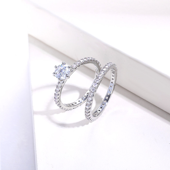 anillo de pareja de latón en plata con baño de circonitas joyería de boda para mujer