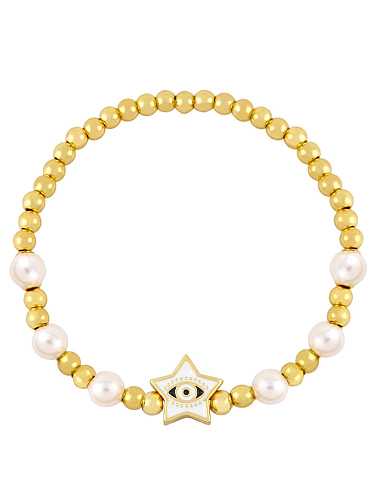 Bracelet de perles vintage en laiton imitation perle émail mauvais œil