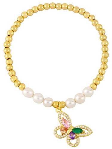 Bracelet perlé minimaliste papillon en laiton et zircon cubique