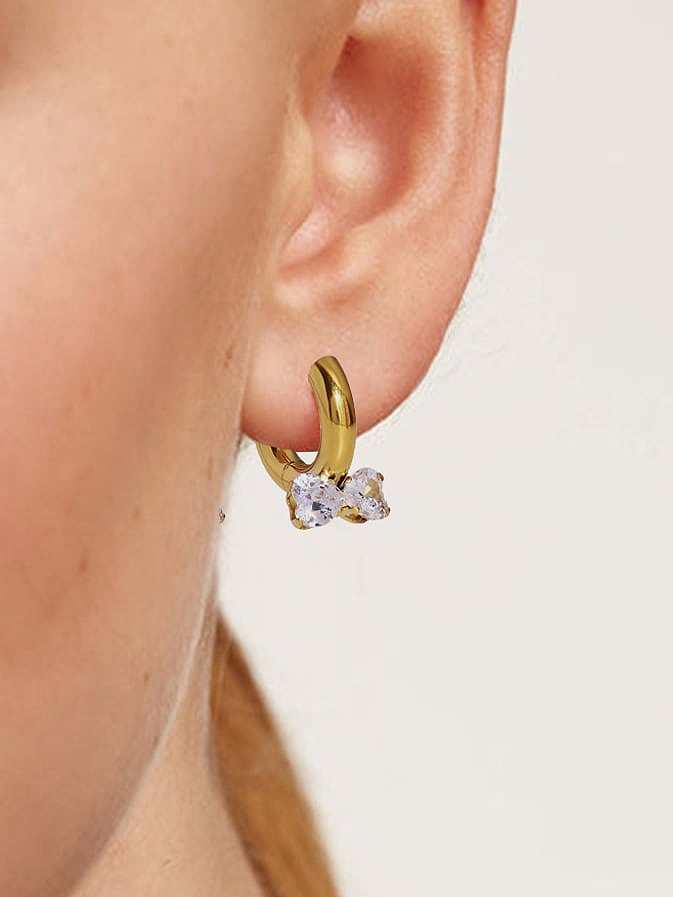Boucles d'oreilles vintage Huggie en acier inoxydable avec zircon cubique et nœud papillon
