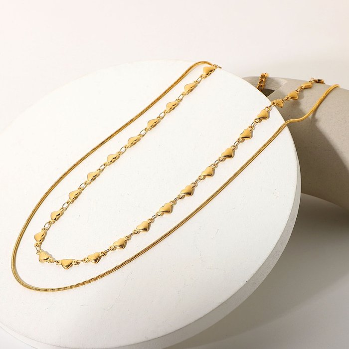 Colar de metal de aço inoxidável de ouro 18K colar feminino coração duplo popular