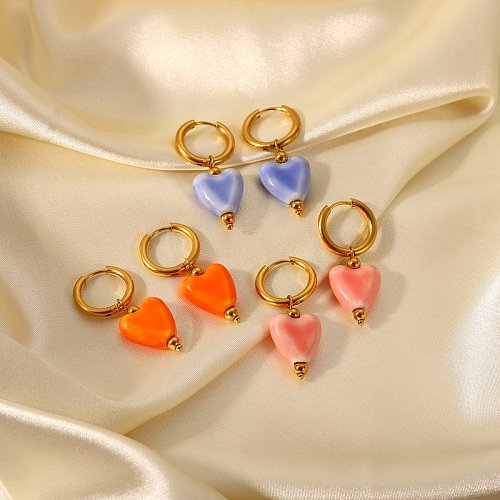 Boucles d'oreilles pendantes en forme de cœur en céramique en acier inoxydable plaqué or 18 carats
