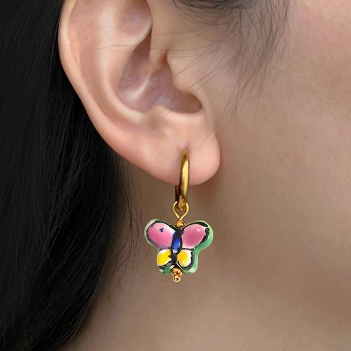 Boucles d'oreilles pendantes en céramique papillon fleur en acier inoxydable plaqué or 18 carats