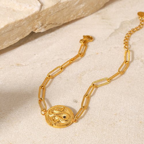 Bracelet en acier inoxydable en or 18 carats avec chaîne en croix de marque ronde en relief en forme de serpent