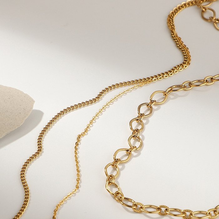 einfache herzförmige mehrschichtige Halskette aus Edelstahl mit unregelmäßigem Anhänger